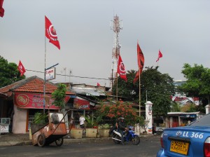 Buildings with flags from the party of Sukarno's daughter, Ibu Megawati, who was once president and is running again for the office.