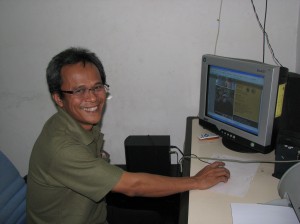 Mr. Edy Hendras, Indonesian conservationist extraordinaire, editing OFI's  Indonesian language newsletter