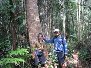 Mr. Freddy and Dayak village elder Mr. Ijai on forest land bought by OFI 